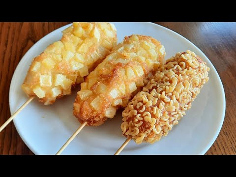 Видео: КОРЕЙСКИЙ СТРИТ ФУД КОРН- ДОГ !Вкуснейшая корочка из картошки, хрустящая панировка из рамена!