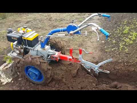 Видео: Мотоблок Мотор Сич + конный оборотный плуг испытание
