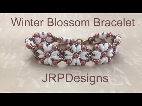 Видео: Браслет «Зимний цветок» — урок для левшей
