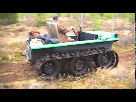 Видео: Вездеход Охотец с расширителями по болоту в Сургуте