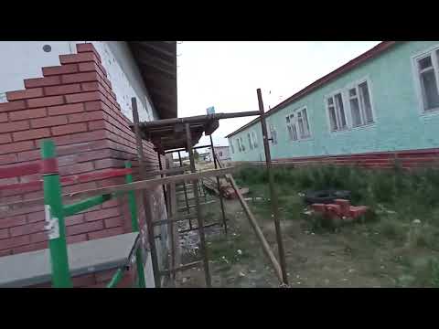 Видео: Новый Уренгой строительство нового дома. Кирпичная кладка.