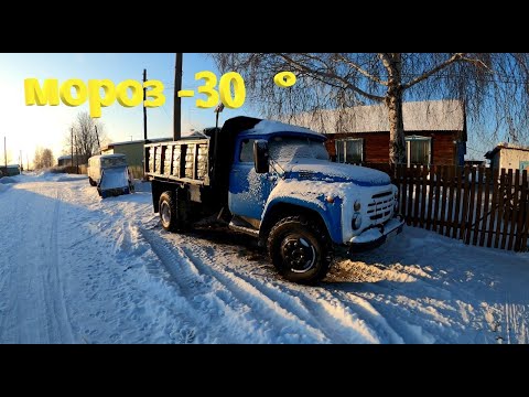 Видео: Запуск Зил-130 в -30° мороза! При помощи подогрева 220В и паяльной лампы! Экстремальные морозы!!!