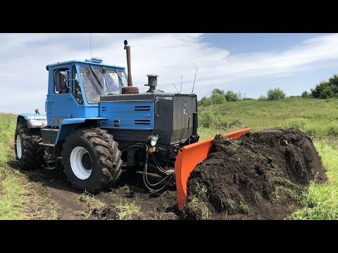 Видео: Трактор Т 150 ровняем дорогу к полю