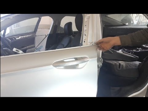 Видео: Ford Fusion как снять наружную ручку двери.