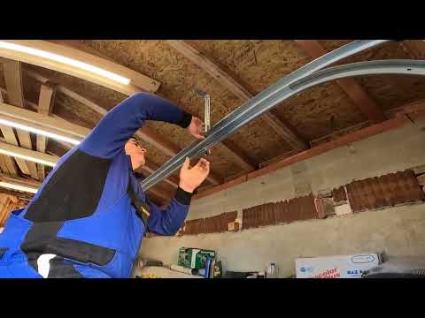 Видео: Монтаж на гаражна секционна врата HORMANN - RenoMatic 2024 г. K2 DOORS