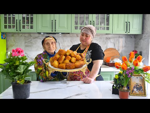 Видео: Бабушка готовит хрустящие пончики с заварным кремом