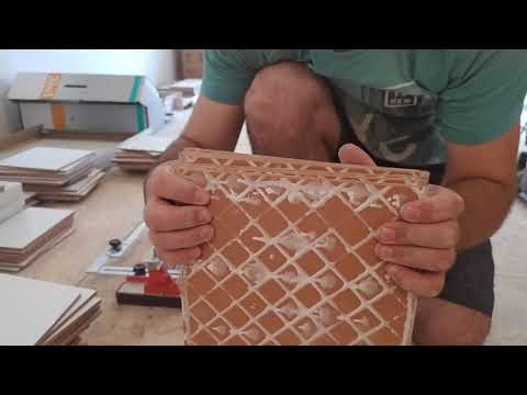 Видео: укладка плитки вокруг дверей.часть 2