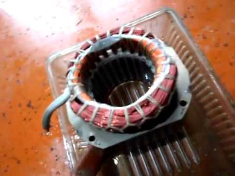 Видео: Пропитка обмоток статора заточного станка лаком.
