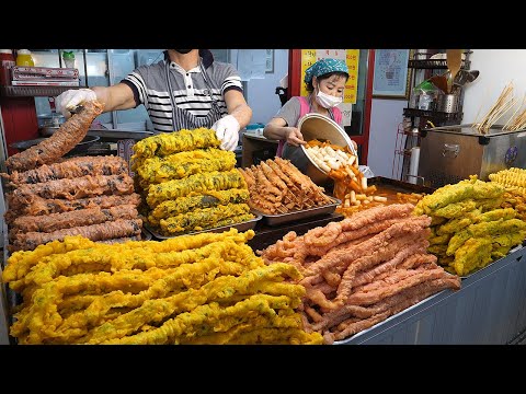 Видео: гигантский рулет из водорослей, жареный кальмар - корейская уличная еда