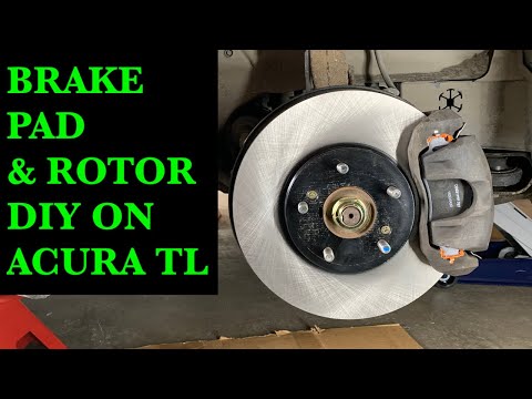 Видео: Замена передних тормозных колодок и роторов Acura TL