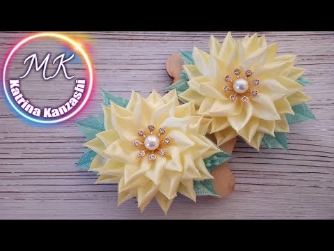 Видео: Нежные цветы из атласной ленты / Delicadas flores de fita de cetim.