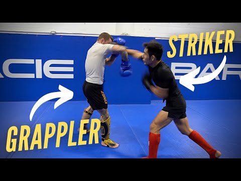 Видео: Ударник против обладателя черного пояса по бразильскому джиу-джитсу высокого уровня