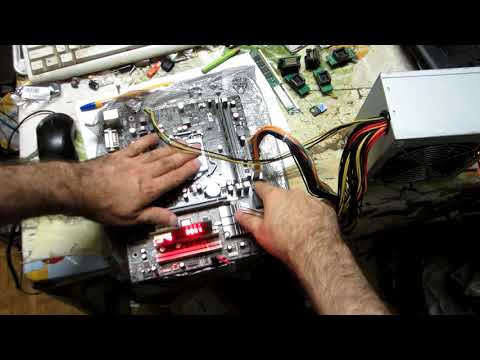 Видео: Восстановление работоспособности материнской платы ECS H67H2-M3 (перепрошивка)