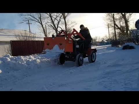 Видео: Уборка снега, стрела без плавающего режима.