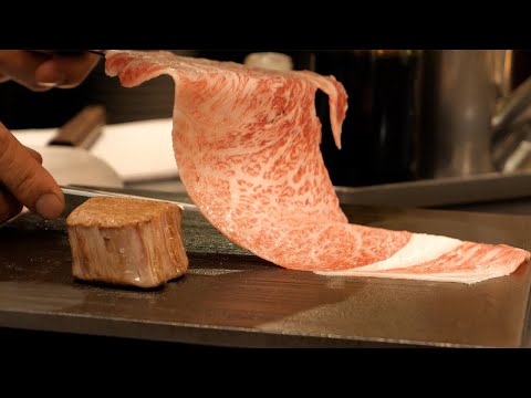Видео: Японская черная говядина Teppanyaki Steakhouse SUTEKIYA в Осаке, Япония
