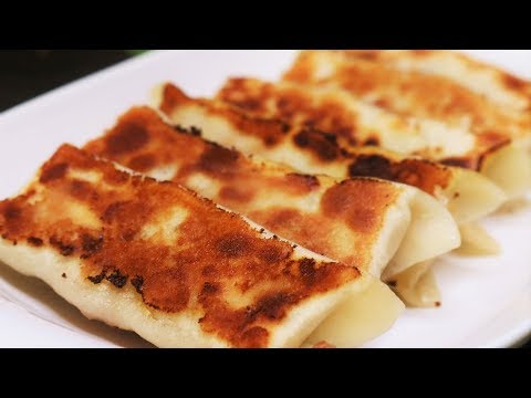 Видео: ЛУЧШЕ, ЧЕМ НА ВЫНОС - Рецепт Potstickers из свинины и лука