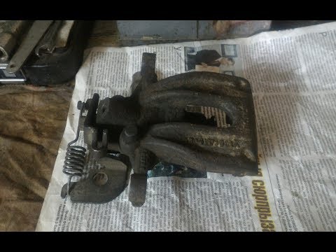 Видео: Ремонт заднего суппорта. Ford Mondeo 3 универсал. Repair of rear brake caliper Ford Mondeo lll.