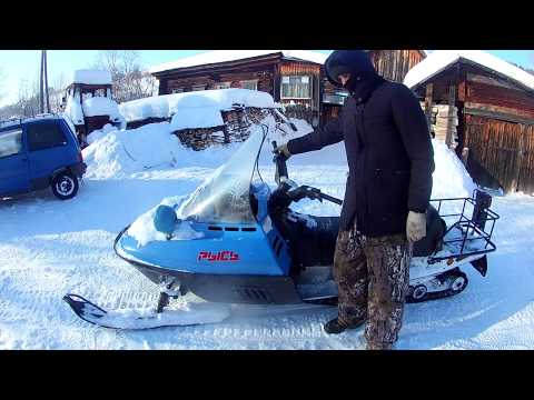 Видео: На снегоходах рысь в пухляк