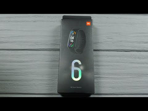 Видео: Xiaomi Mi Band 6 Распаковка и Сравнение с Mi Band 5