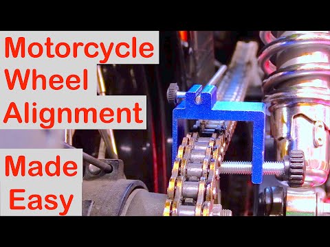 Видео: «Выравнивание цепи мотоцикла»: теперь это просто!