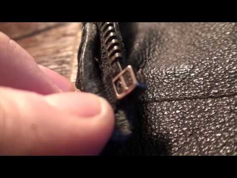 Видео: Ремонт ограничителя замка молнии.