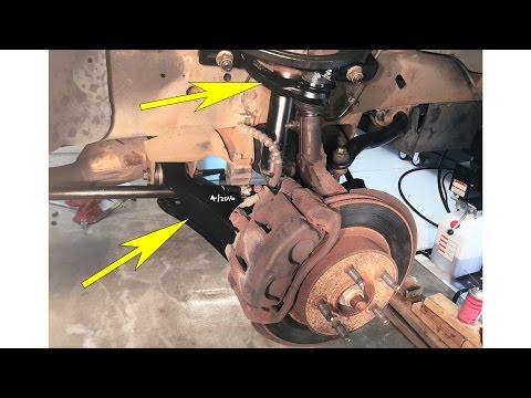 Видео: Замена переднего, верхнего и нижнего рычага на Ford Explorer 2000 года выпуска