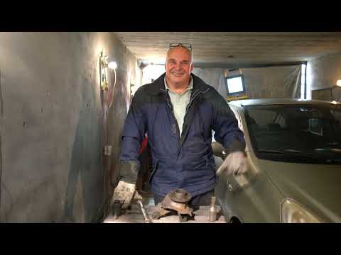 Видео: Замена подшипника ступицы переднего колеса на автомобиле Opel Corsa D.