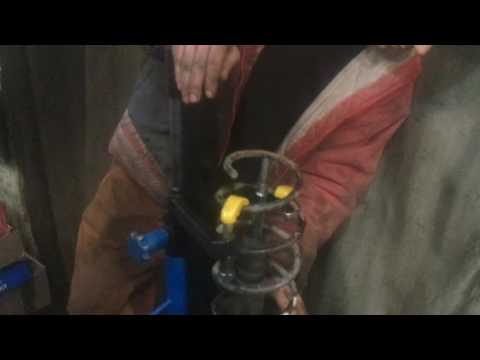 Видео: Стяжка пружин