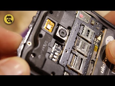 Видео: 🔥 КРАШ-ТЕСТ защищенного СМАРТФОНА. Забивание гвоздей, заморозка, кипяток. Ulefone Armor 2