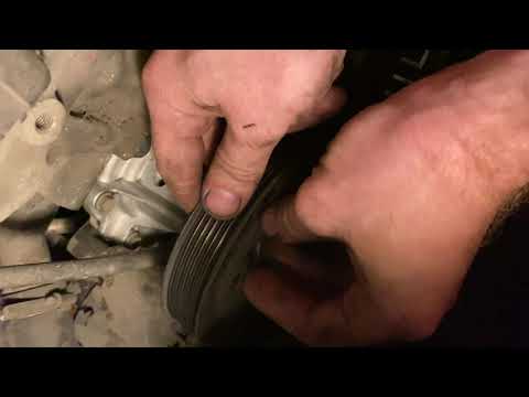 Видео: Замена помпы ssang yong kyron