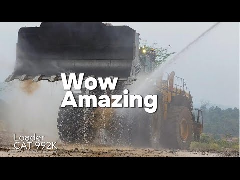 Видео: Вау, какое потрясающее видео! Погрузчик CAT 992K