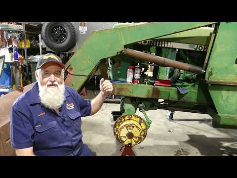 Видео: Как заменить протекающие сальники передней ступицы на полноприводном тракторе John Deere. Часть 1