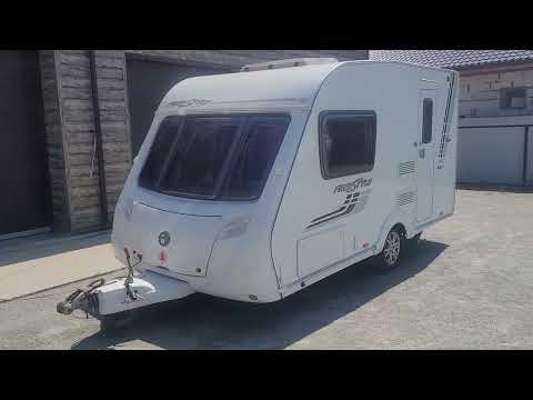 Видео: ОБЗОР КАРАВАНА-МВЛЫША SWIT FREESTYLE 2011 г