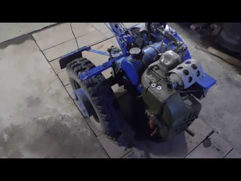 Видео: Мотоблок МТЗ. Установка крыльев.