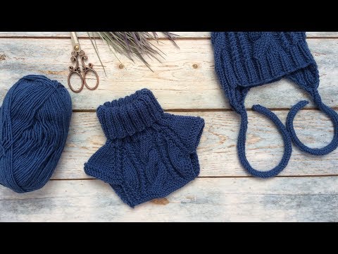 Видео: Вязаная манишка для ребенка