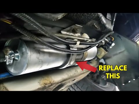 Видео: Замена топливного фильтра BMW E36