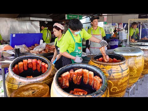 Видео: Самая известная хрустящая свинина и курица в Таиланде, приготовленная в огромных печах-кувшинах