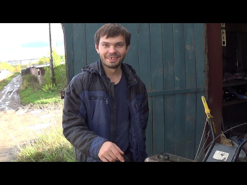 Видео: замена моторного масла в мотоблоке Урал