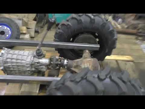 Видео: Крепление заднего моста с рамой минитрактора и соединение его с коробкой передач.