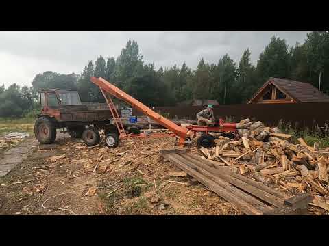 Видео: Как работает транспортёр для дров с дровоколом Друг-2 