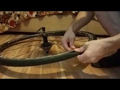 Видео: Как одеть покрышку на шоссейном велосипеде