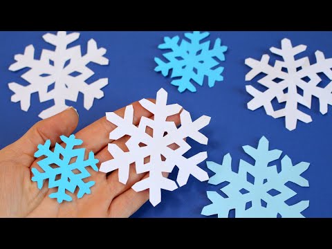 Видео: DIY Маленькая снежинка из бумаги / Простые Новогодние поделки из бумаги /Как легко вырезать снежинку