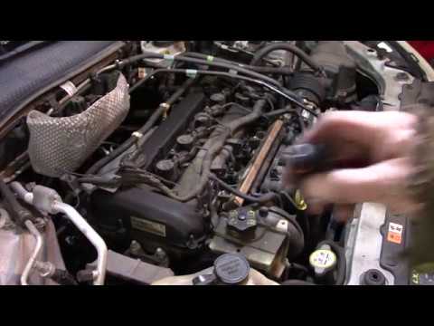 Видео: Замена топливной форсунки Ford Focus 2008 года
