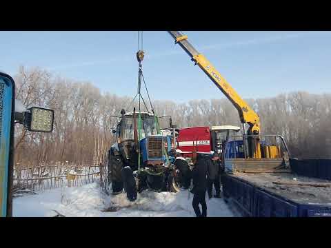Видео: Погрузка и перевозка воровайкой трактор мтз в мороз -30