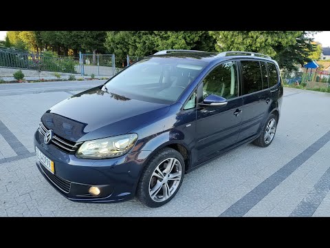 Видео: Огляд VW Touran Life 2014 2.0tdi 140ps