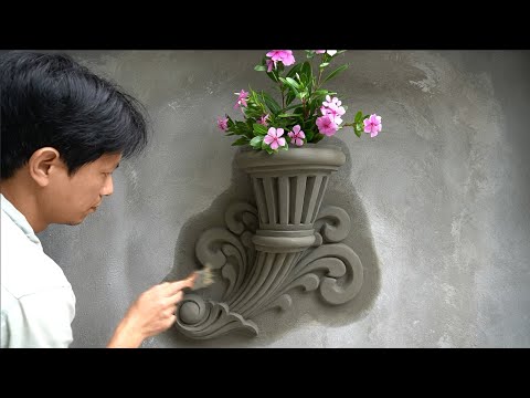 Видео: Идея изготовления уникального настенного цветочного горшка