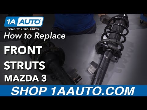Видео: Как заменить передние стойки Mazda 3 04-13