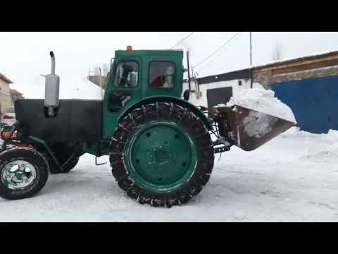 Видео: Уборка снега ковшом на Т 40