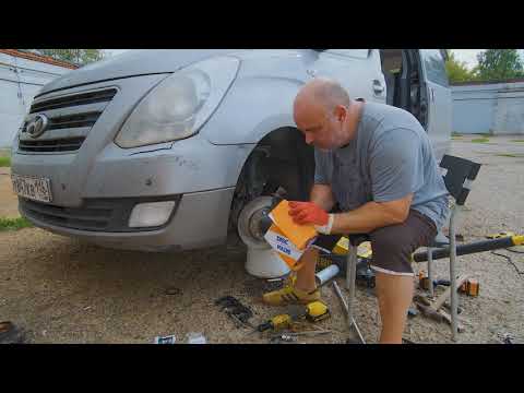 Видео: Hyundai H 1  Замена передней ступицы, тормозных дисков и колодок