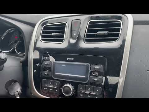 Видео: №2. Демонтаж штатной магнитолы  Renault Logan 2